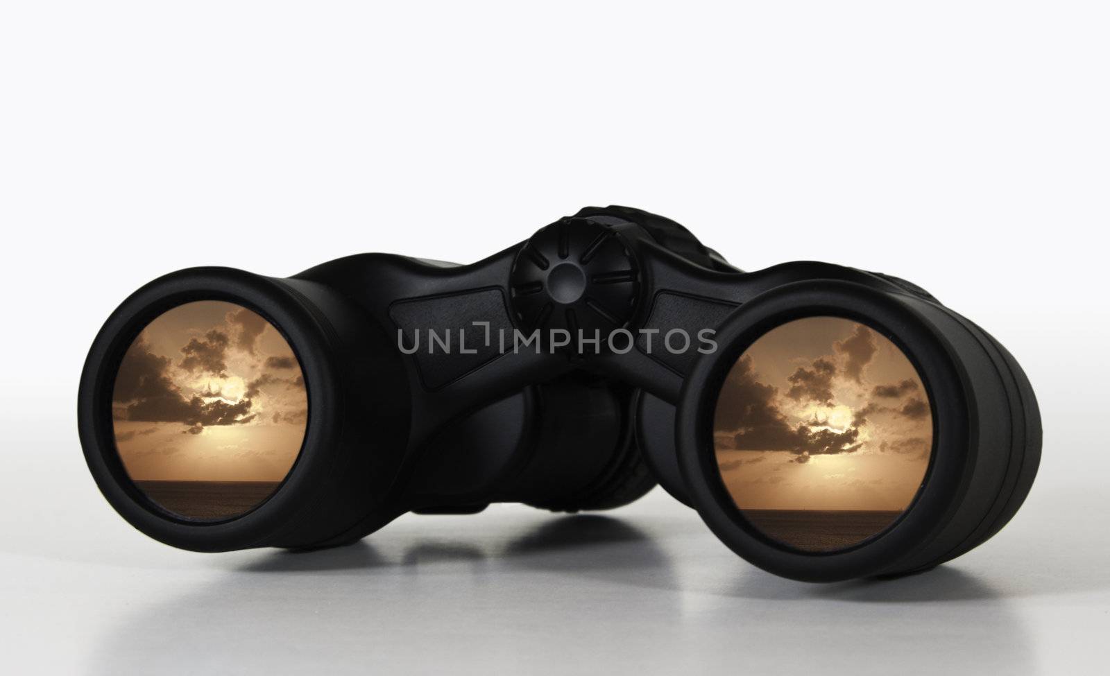 Binoculars with rosy sunset view by steheap