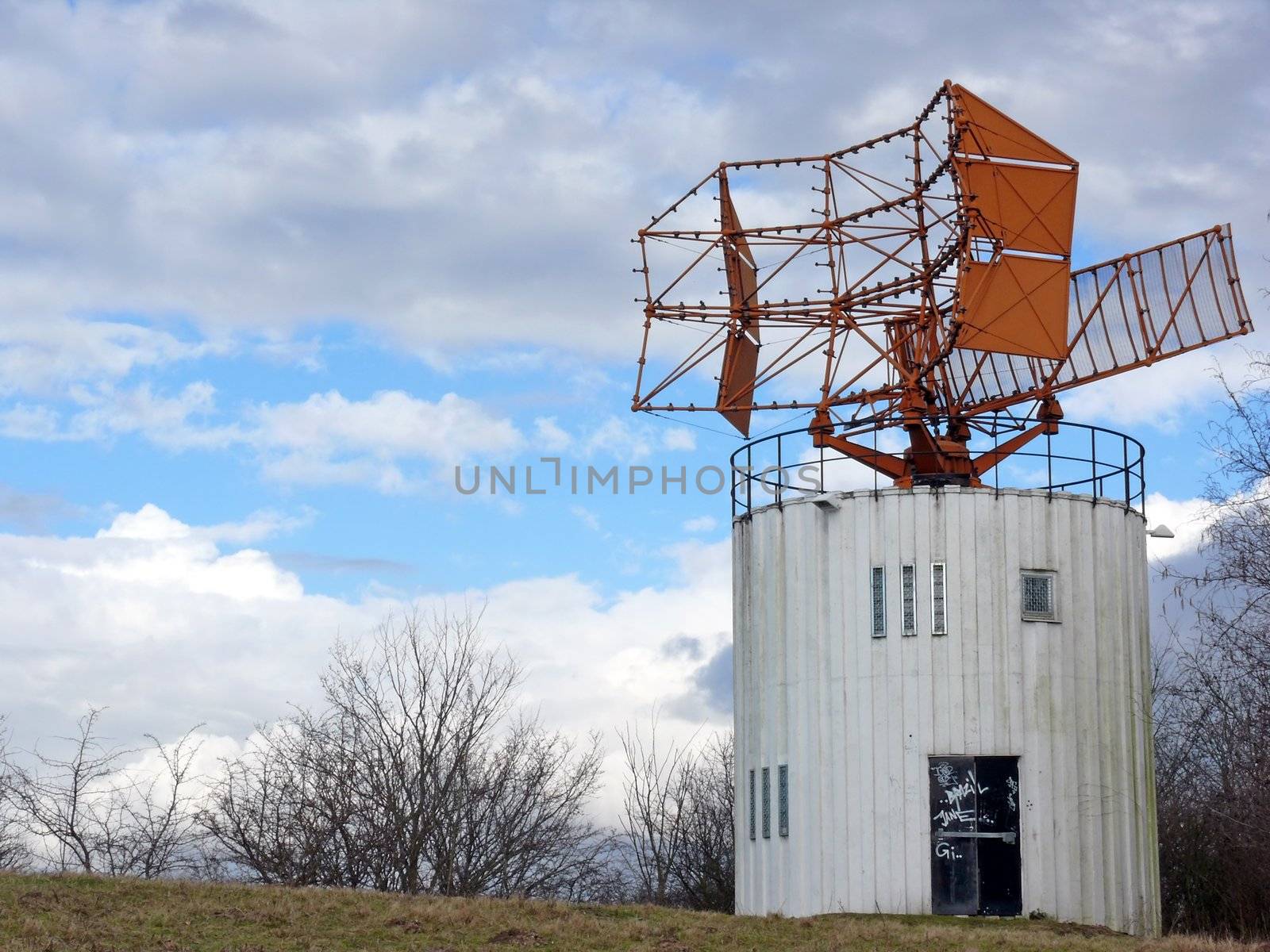 portrait of an old airport tower control building