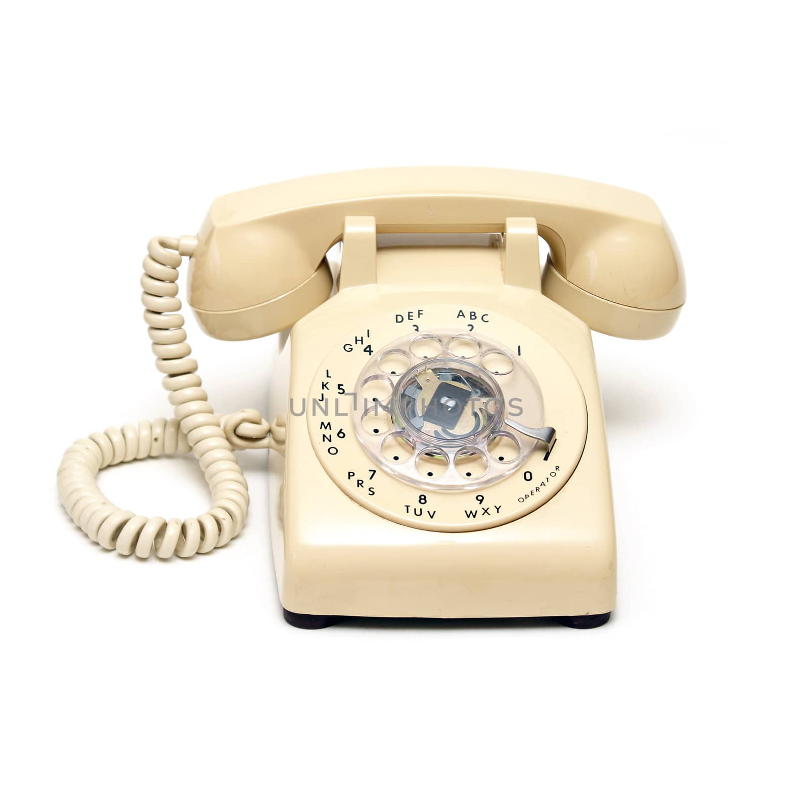 An isolated shot of a traditional rotary phone.