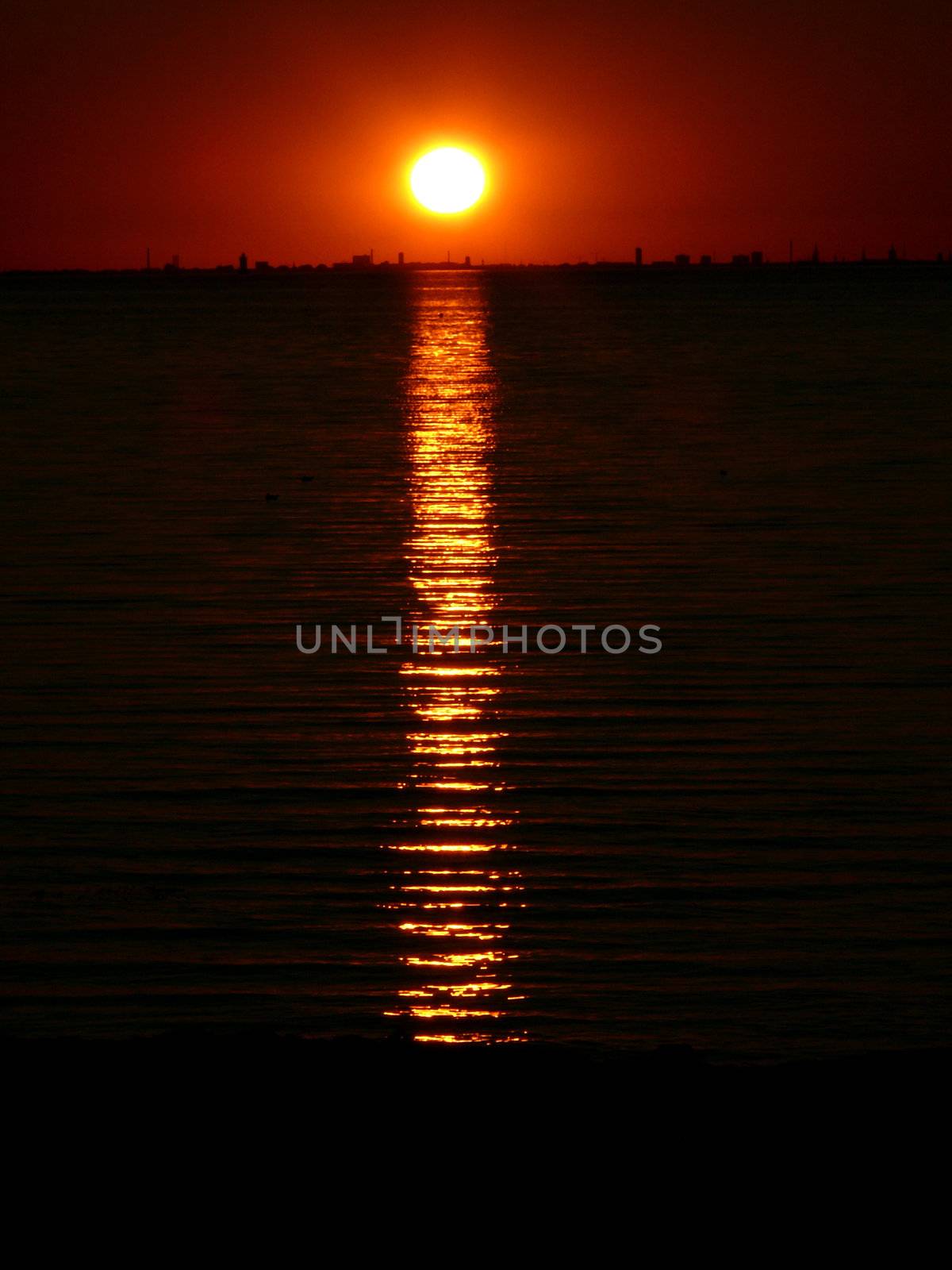 portrait of midnight sun in beautiful sea landscape