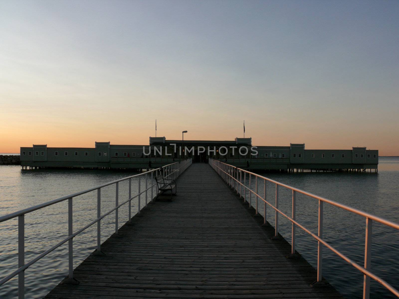 portrait of bath house at ocean coast