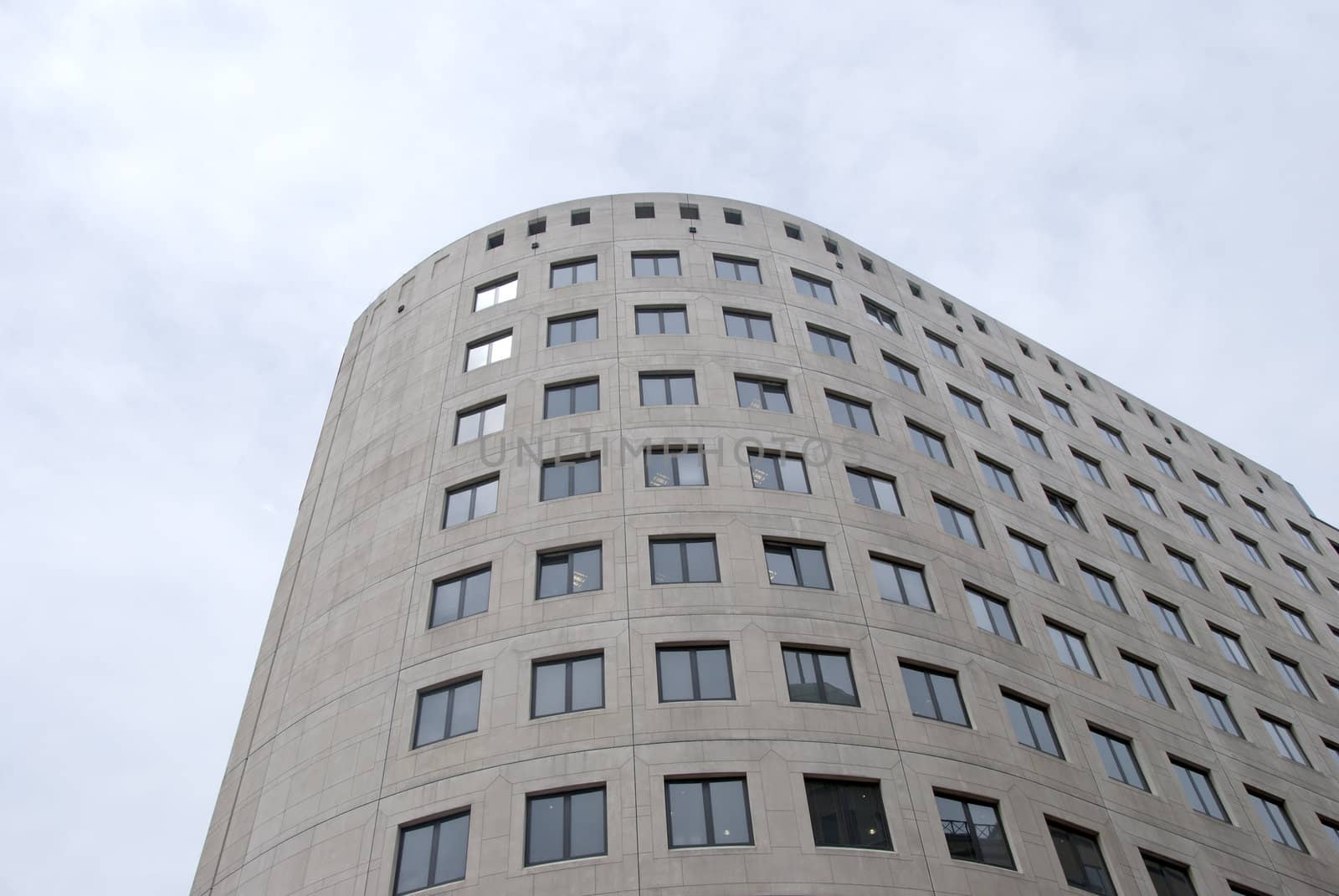 A Grey Office Block under a blue sky