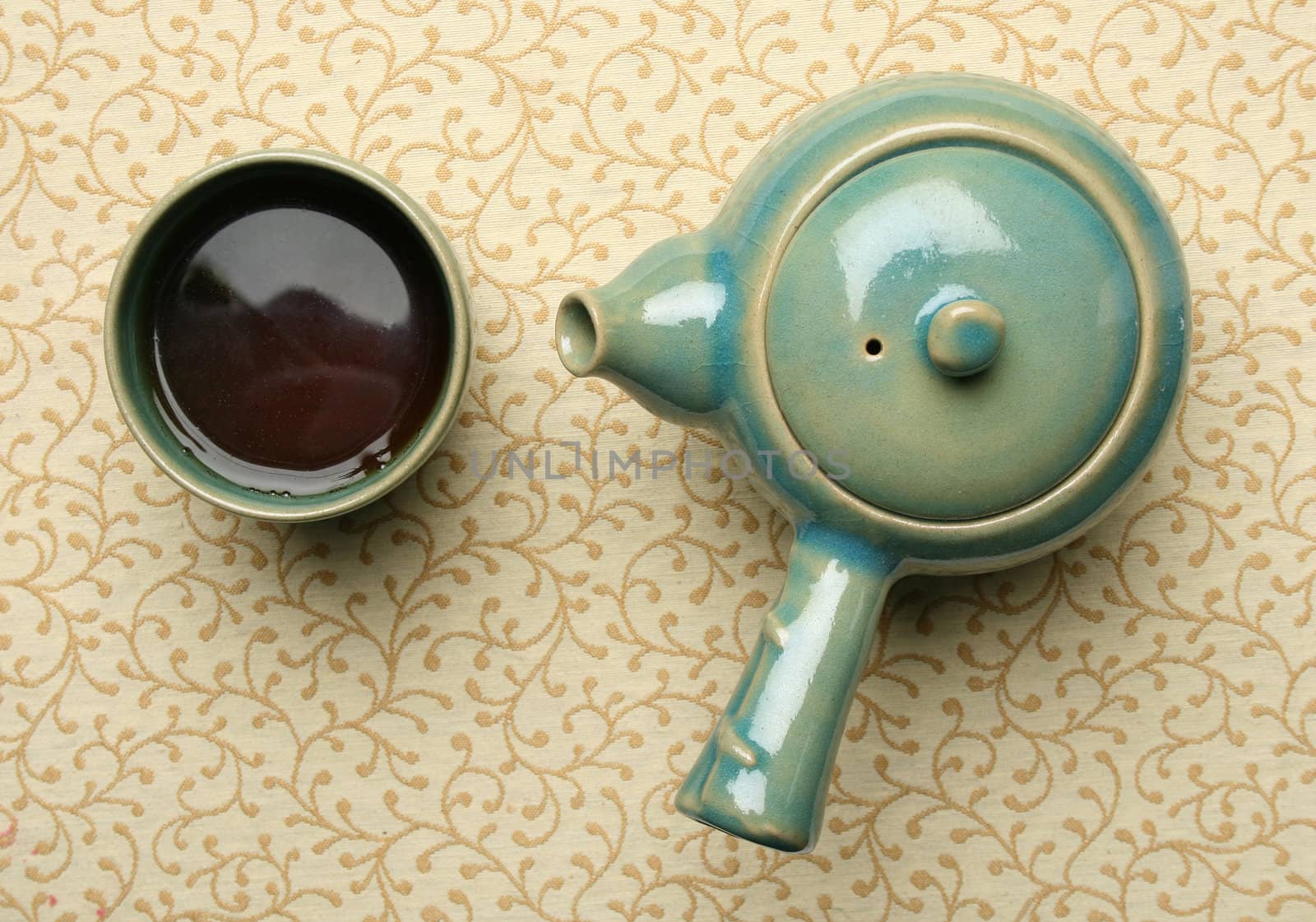 Chinese teapot and a cup of tea by Erdosain
