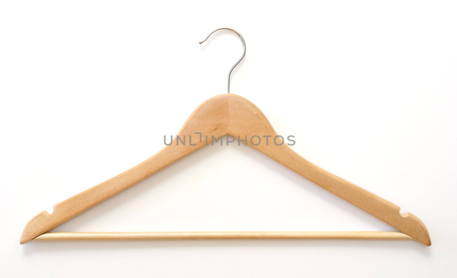A wooden hanger on a white background.