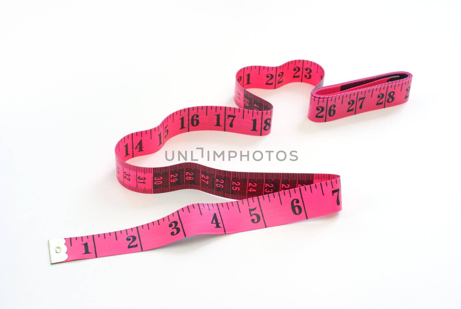 An isolated measuring tape on white background.