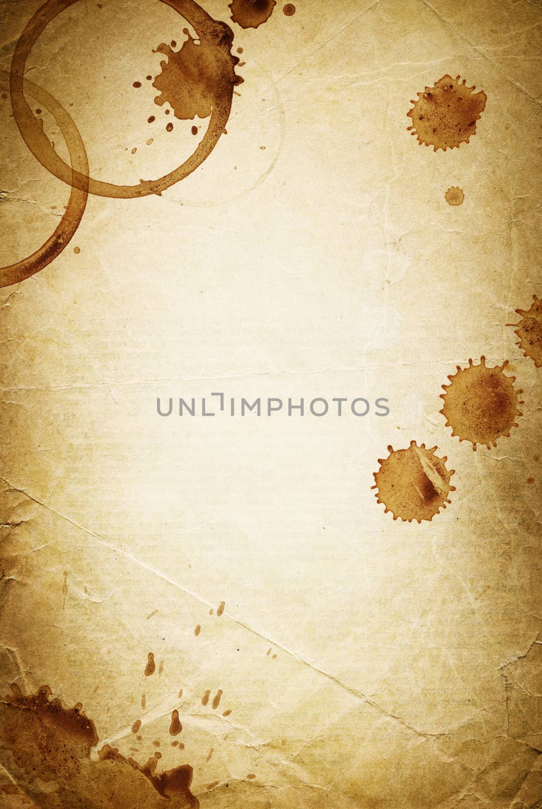 Classic vintage background. Old paper sheet with drops of coffee by pashabo