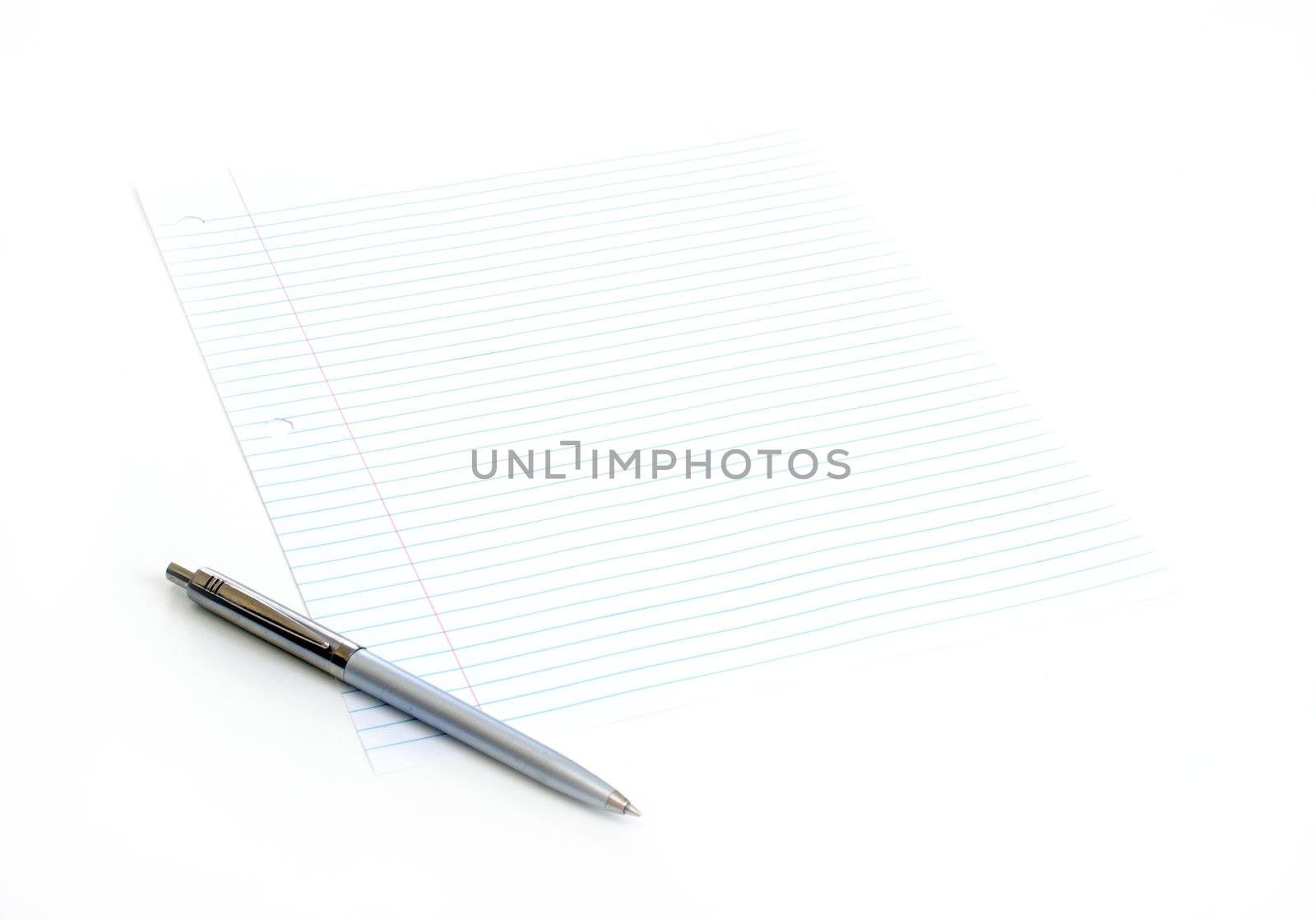 An isolated pen and piece of paper.