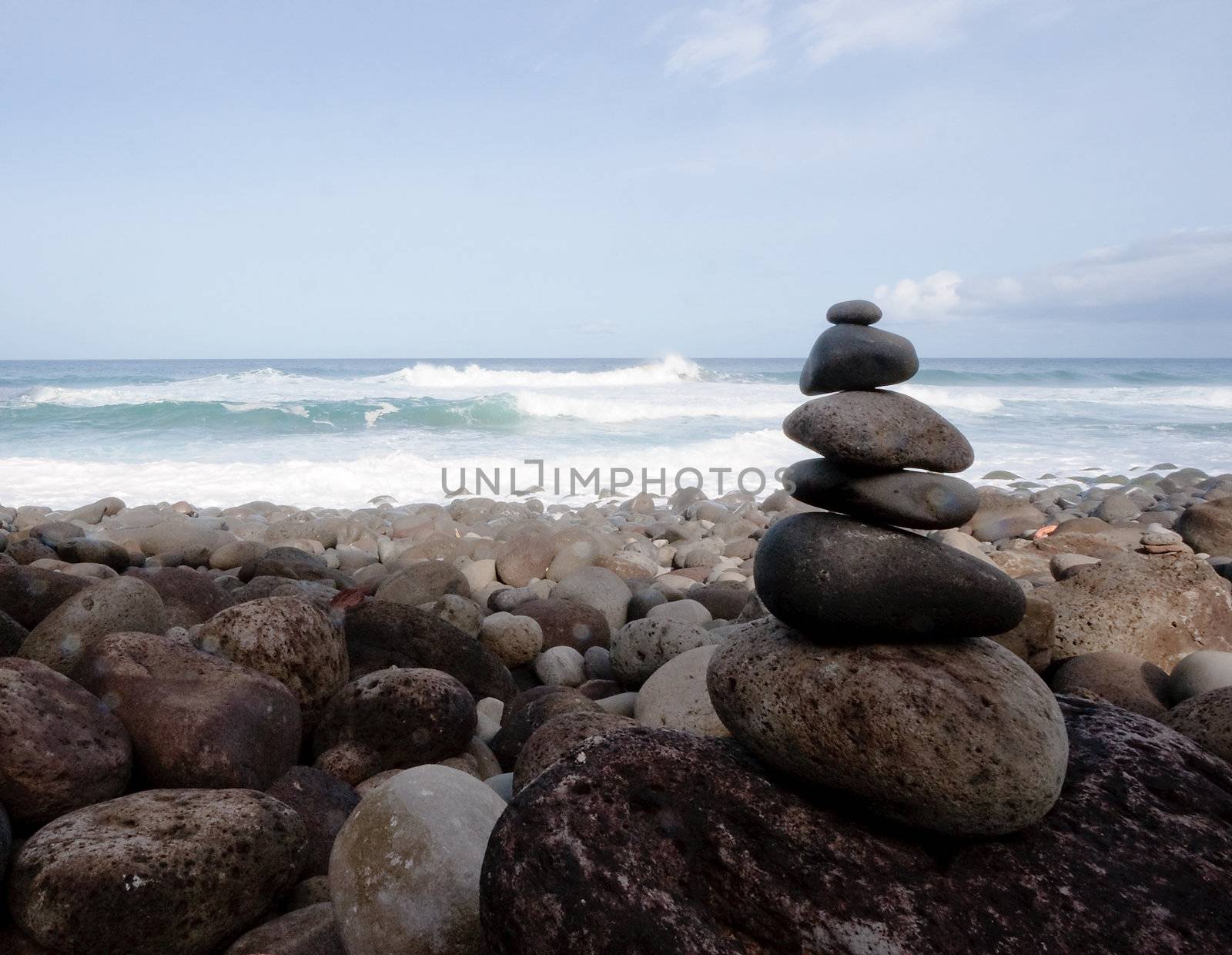 Rock cairn on a rocky beach on the north coast of Kauai