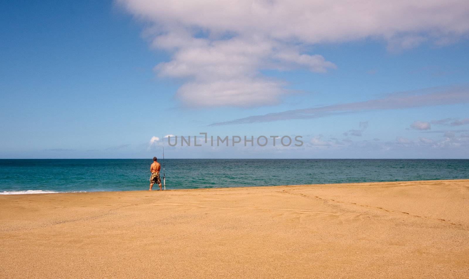 Sea fisherman on an empty beach by steheap
