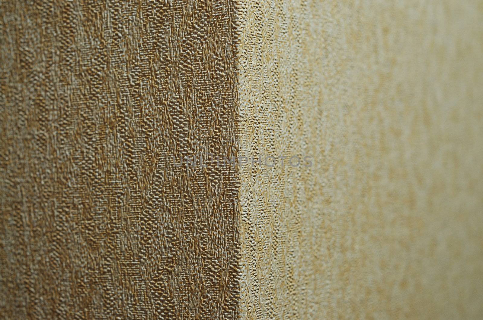 rough texture of a corner wall section in focue to soft blur