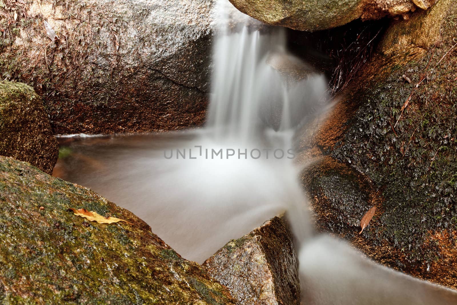 Small natural waterfall in the National Park Sintra-Cascais.