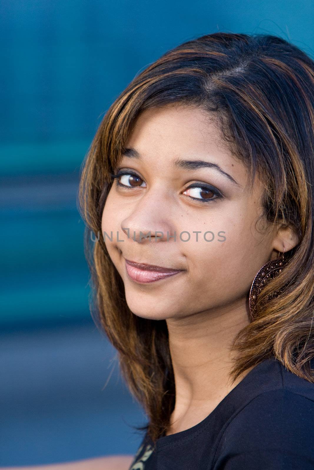 Very beautiful and pretty teenager with brown hair happy smiling