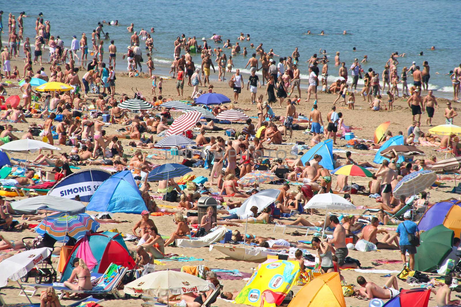 Crowded beach in summer at Scheveningen