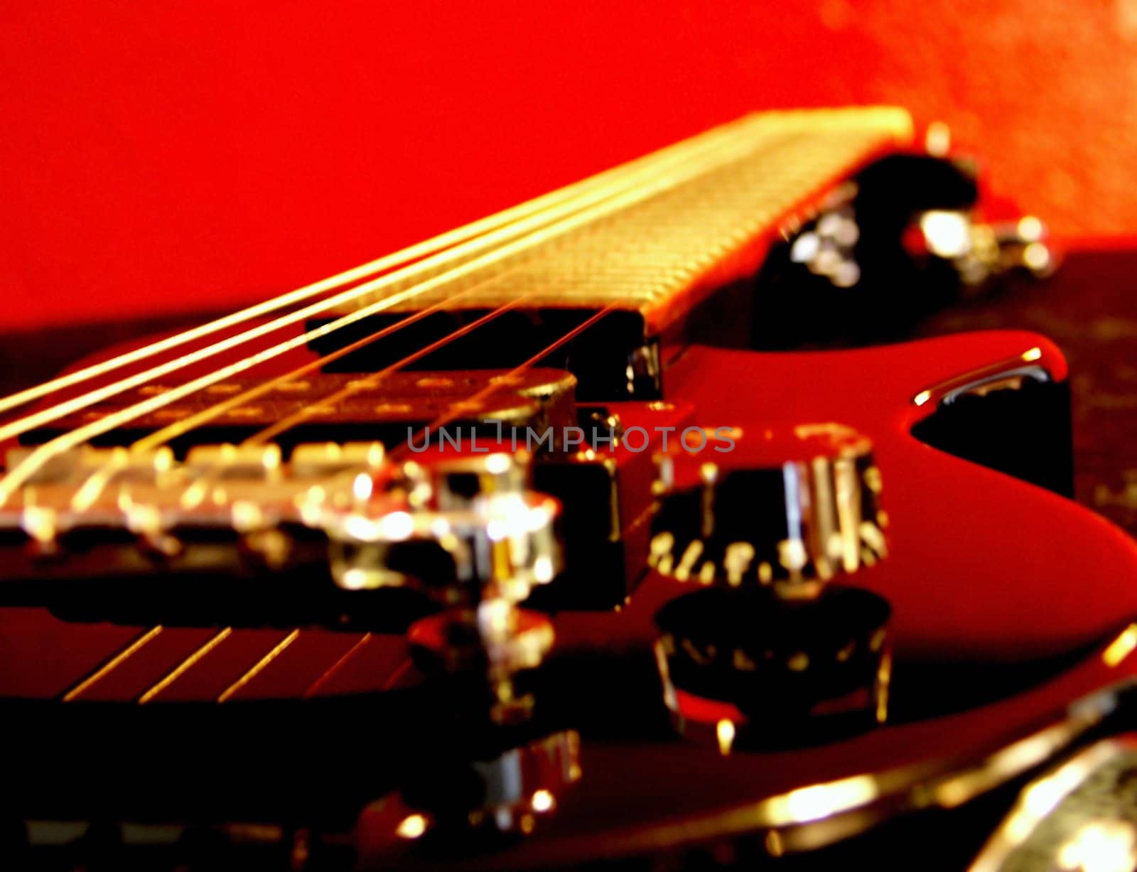 Guitar on red by chaosmediamgt