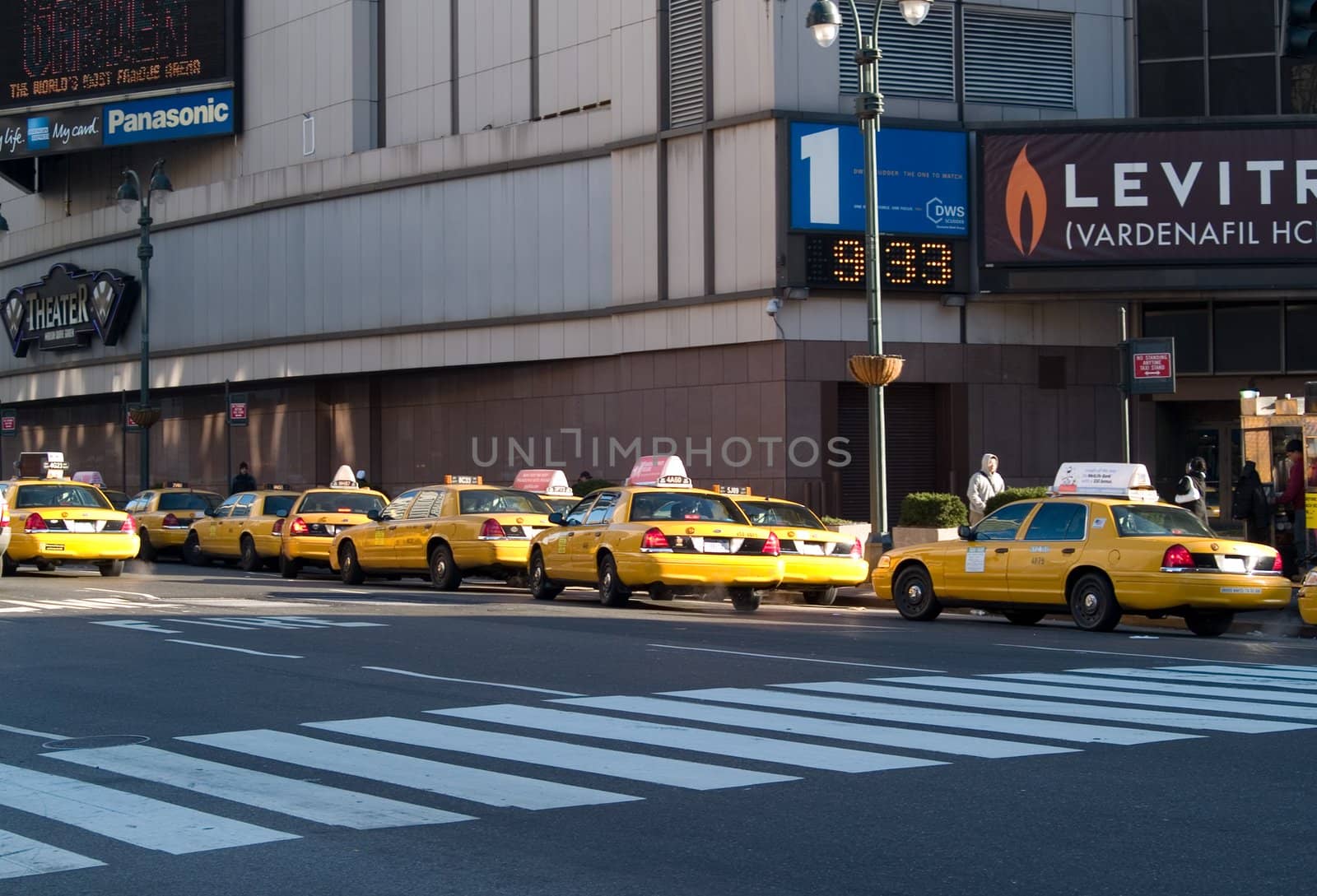Lots of taxis waiting for riders.