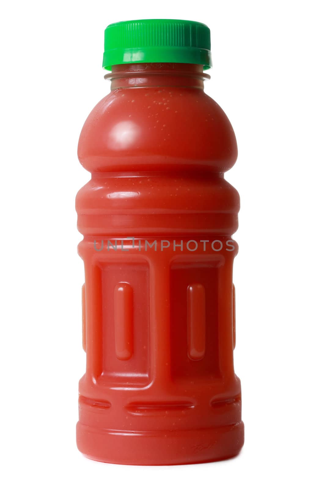 tomato juice in a single portion plastic bottle, isolated on white