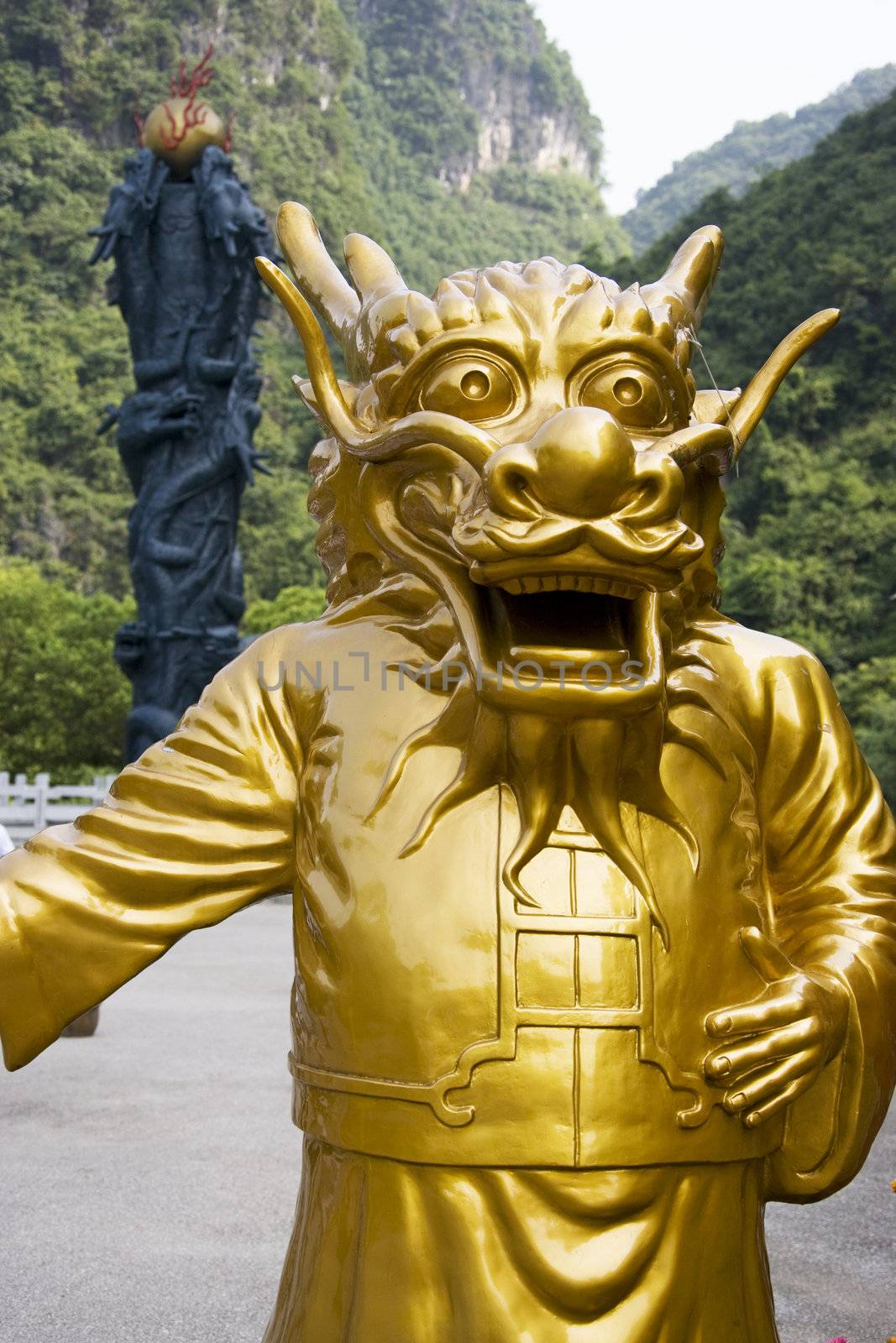 Image of a dragon guardian at the Assembly Dragon Cave entrance, Yangshuo, Guilin, China.