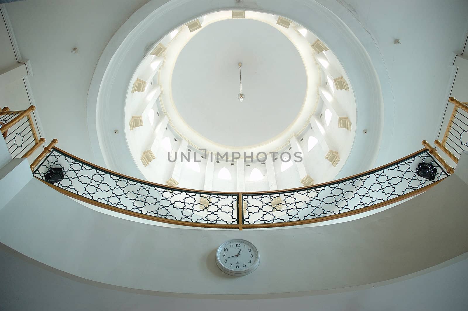 masjid hall with white marble wall and chandler