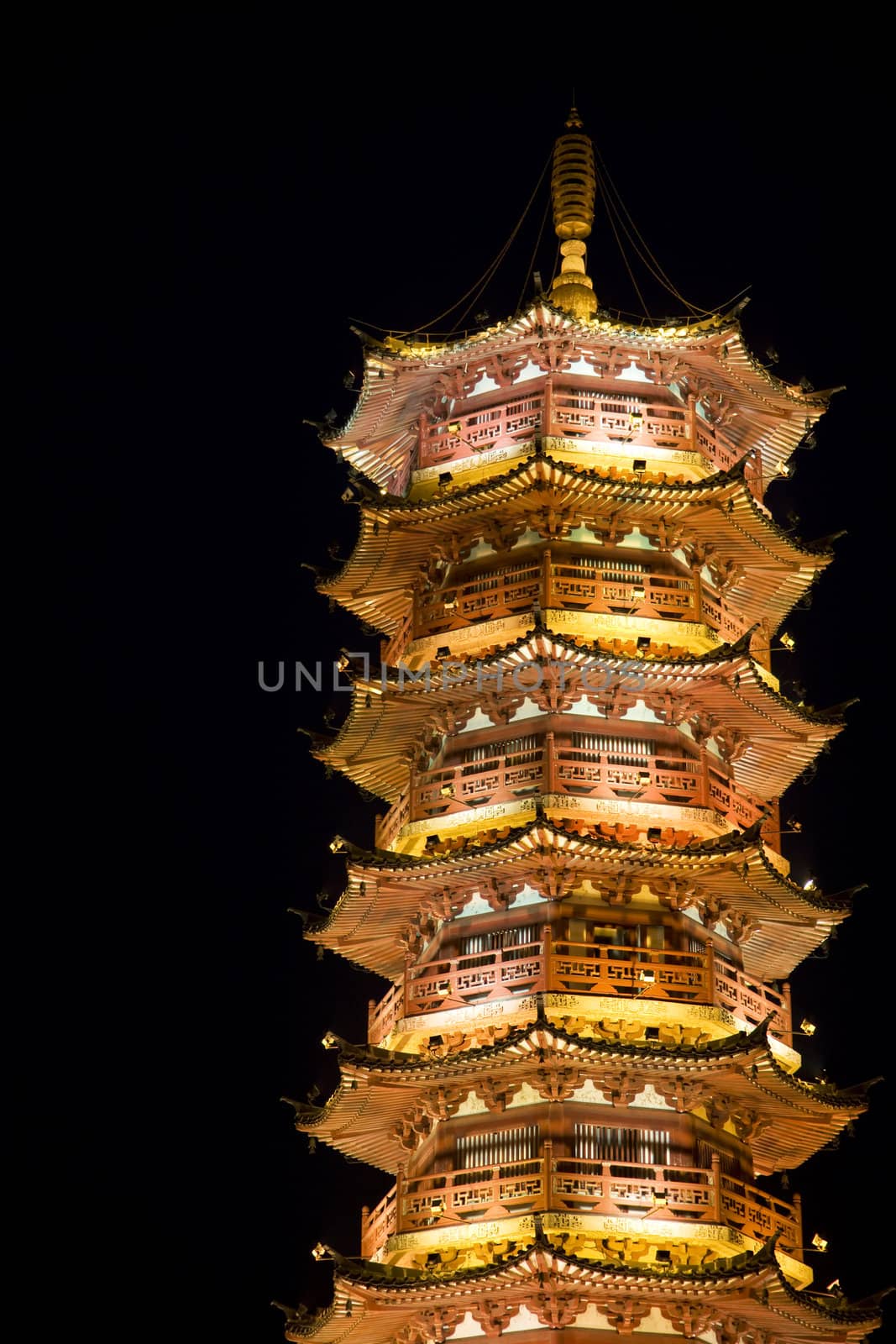 Night image of the Mulong Lake Pagoda at Guilin, China.