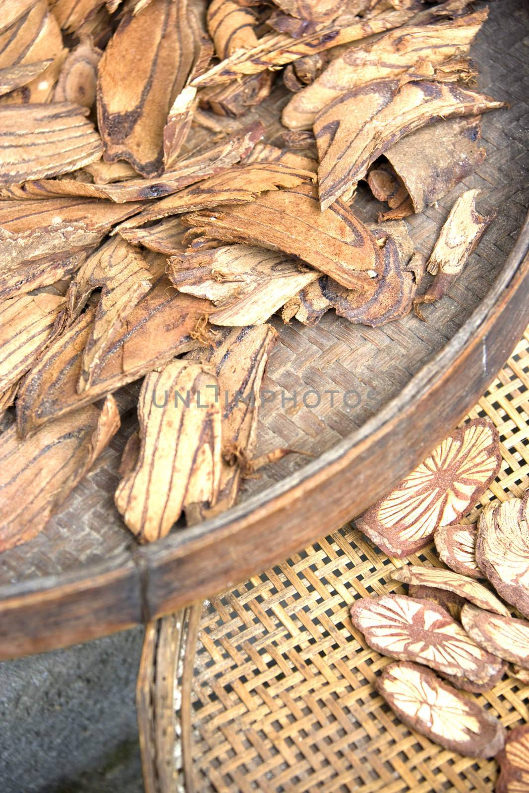 Image of tree barks being sun dried for traditional chinese medicine at the ancient town of Daxu, Guilin, China.