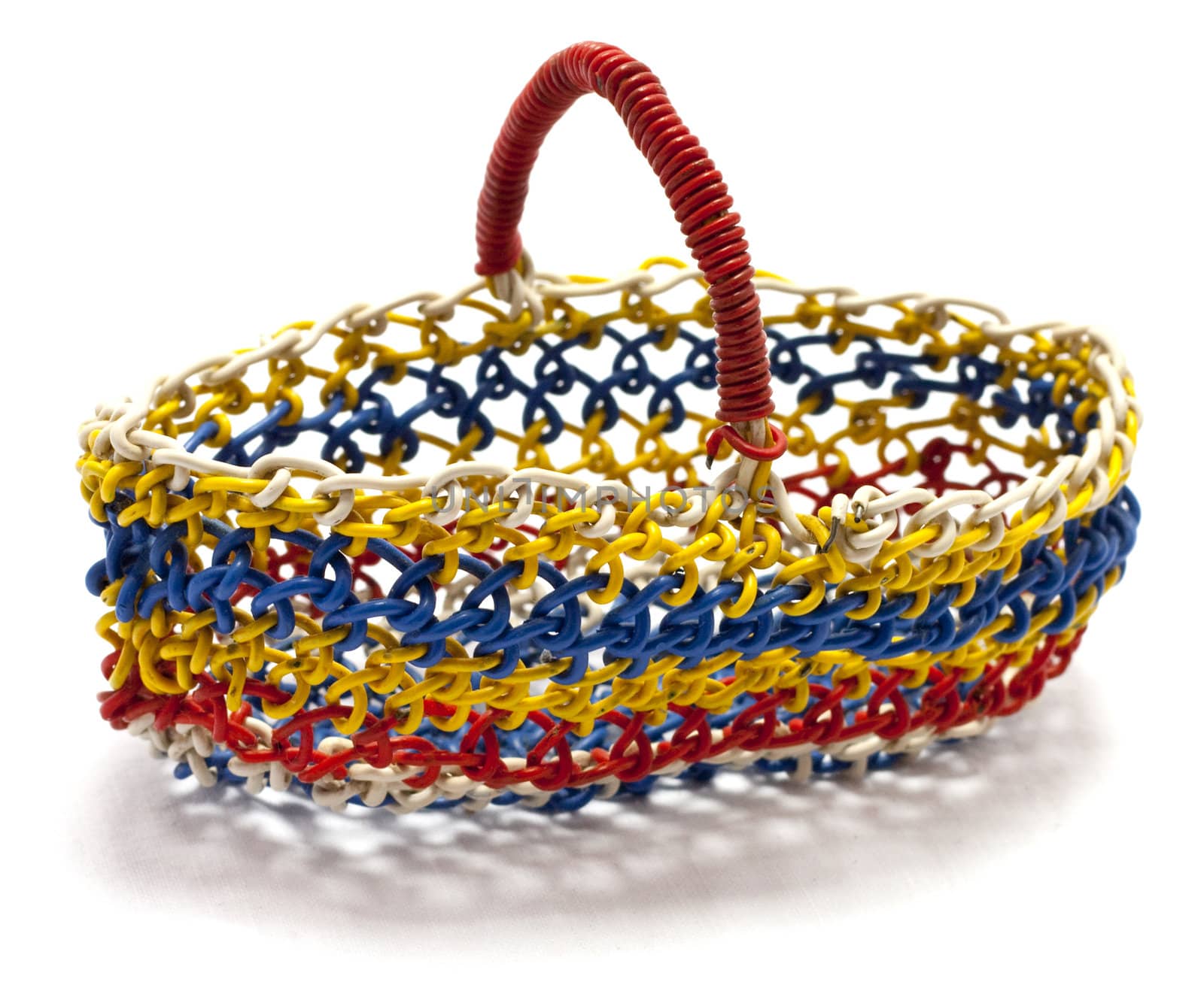 Old colorful basket made from electrical wires