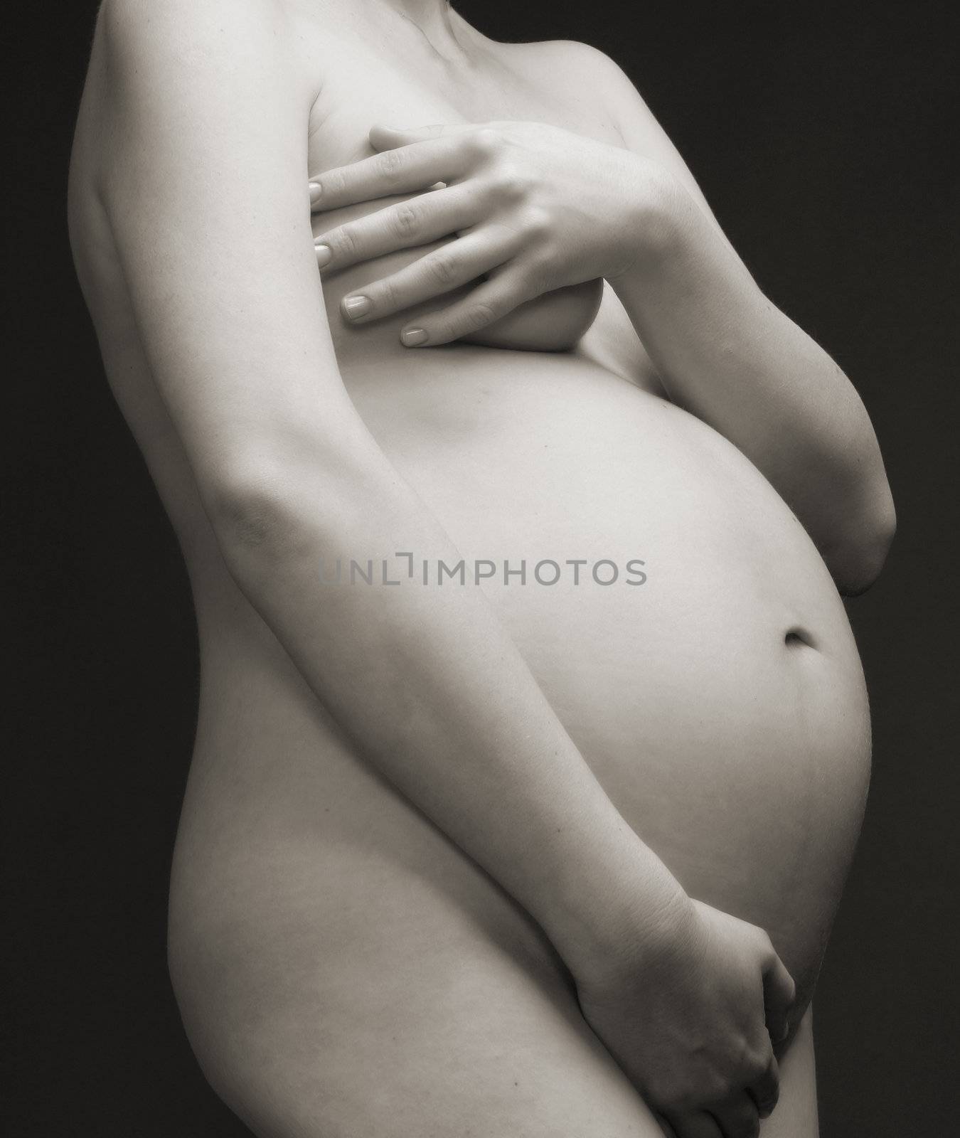 close up view of a pregnant woman's stomach