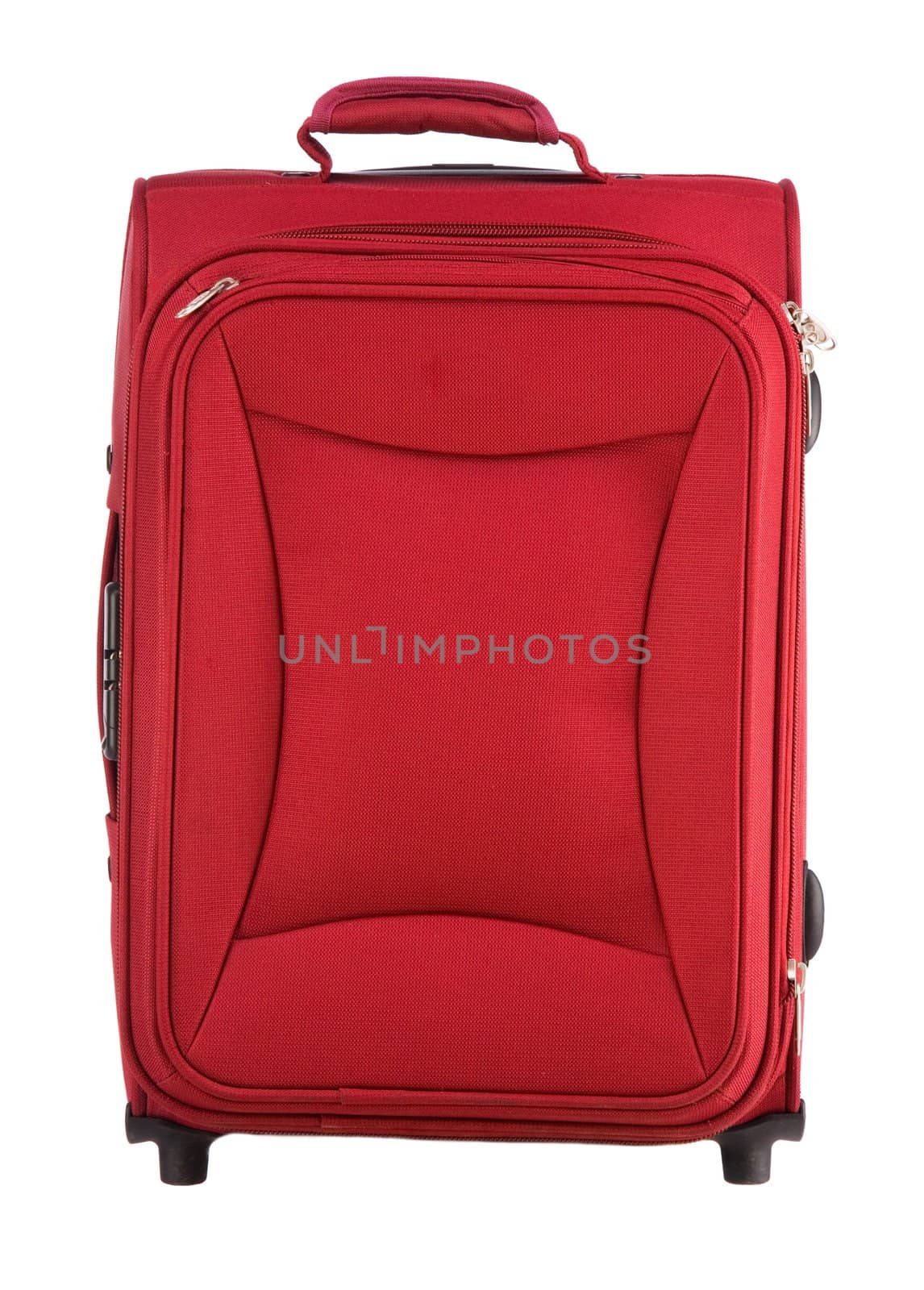 Red suitcase on castors close up on a white background
