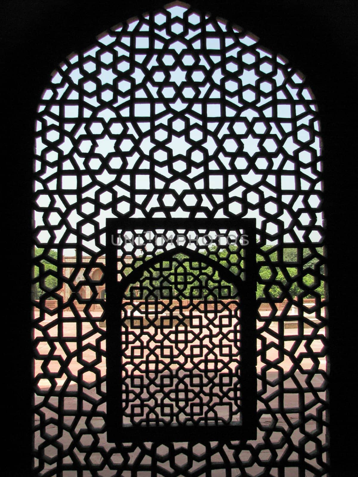 Honeycomb screen looking out of Humayun's Tomb in New Delhi, India