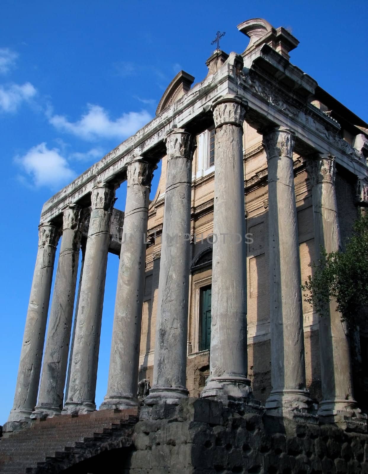Located in the Roman Forum on the Via Sacra this temple was originally known as the Temple of Antoninus and Faustina. It was later converted to the Christian Church of San Lrenza in Miranda.