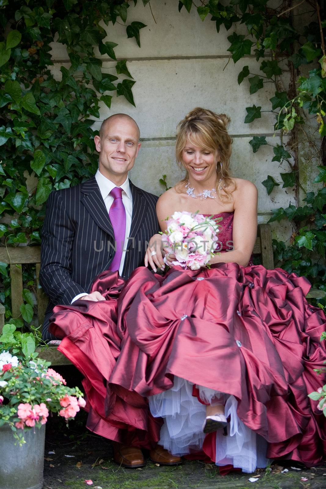 Pretty bride and groom enjoying a quiet moment together