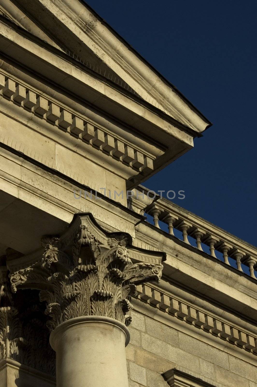 Stone buildings in Trinity College Dublin with Blue sky