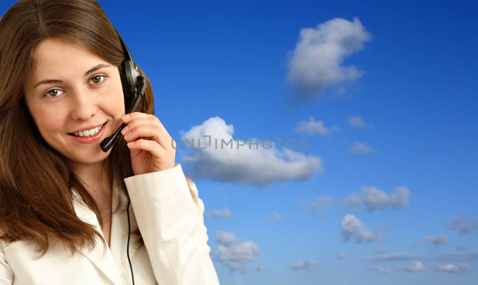 Smiling pretty business woman with headset
