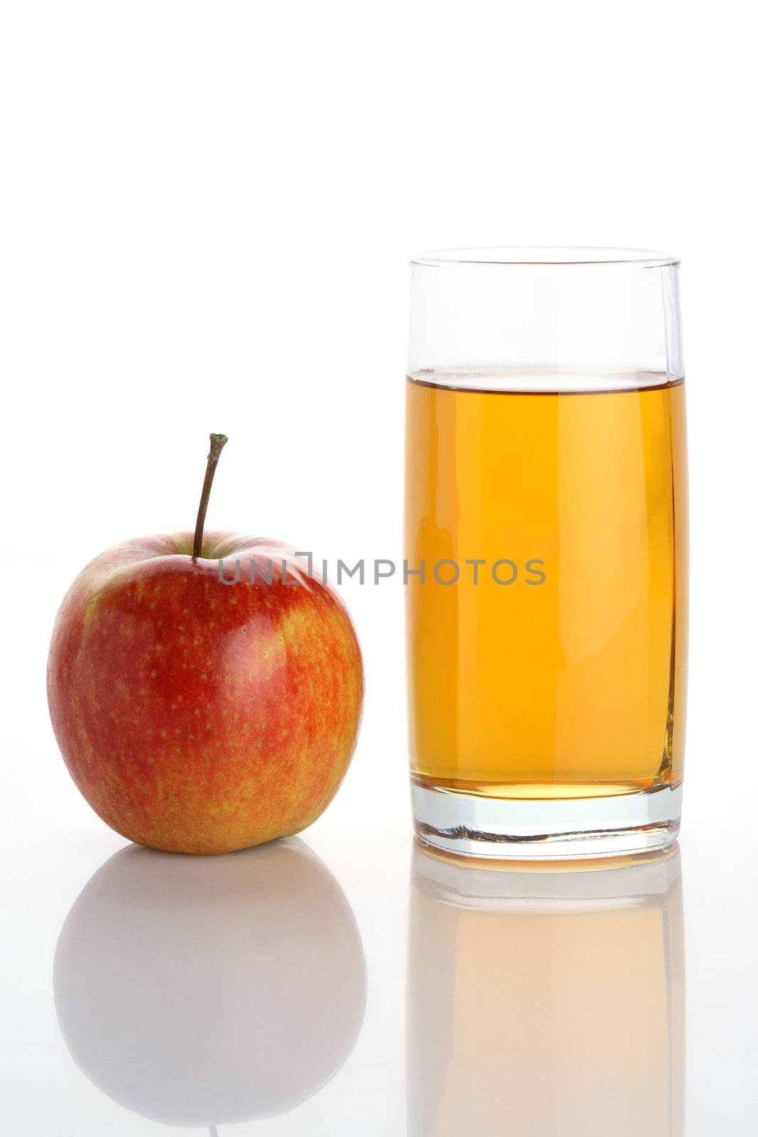 Glass of juice and apple