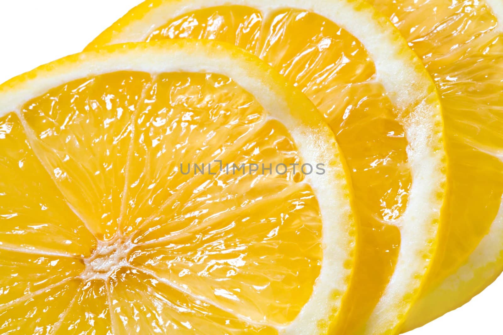 Slices of the cut lemon close up
