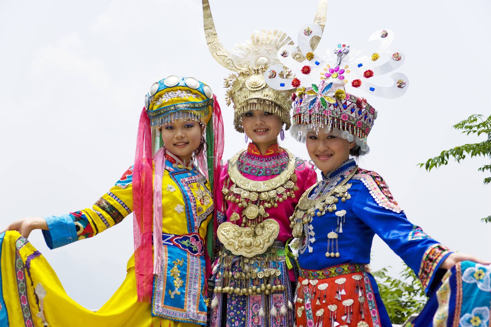 Image of young Chinese girls in traditional ethnic dress at Yao Mountain, Guilin, China.