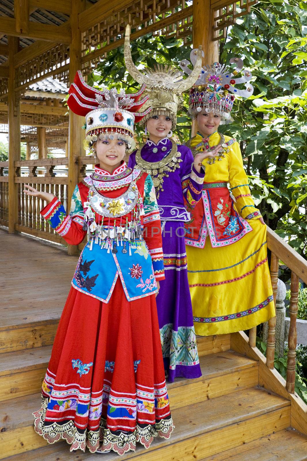 Image of young Chinese girls in traditional ethnic dress at Yao Mountain, Guilin, China.