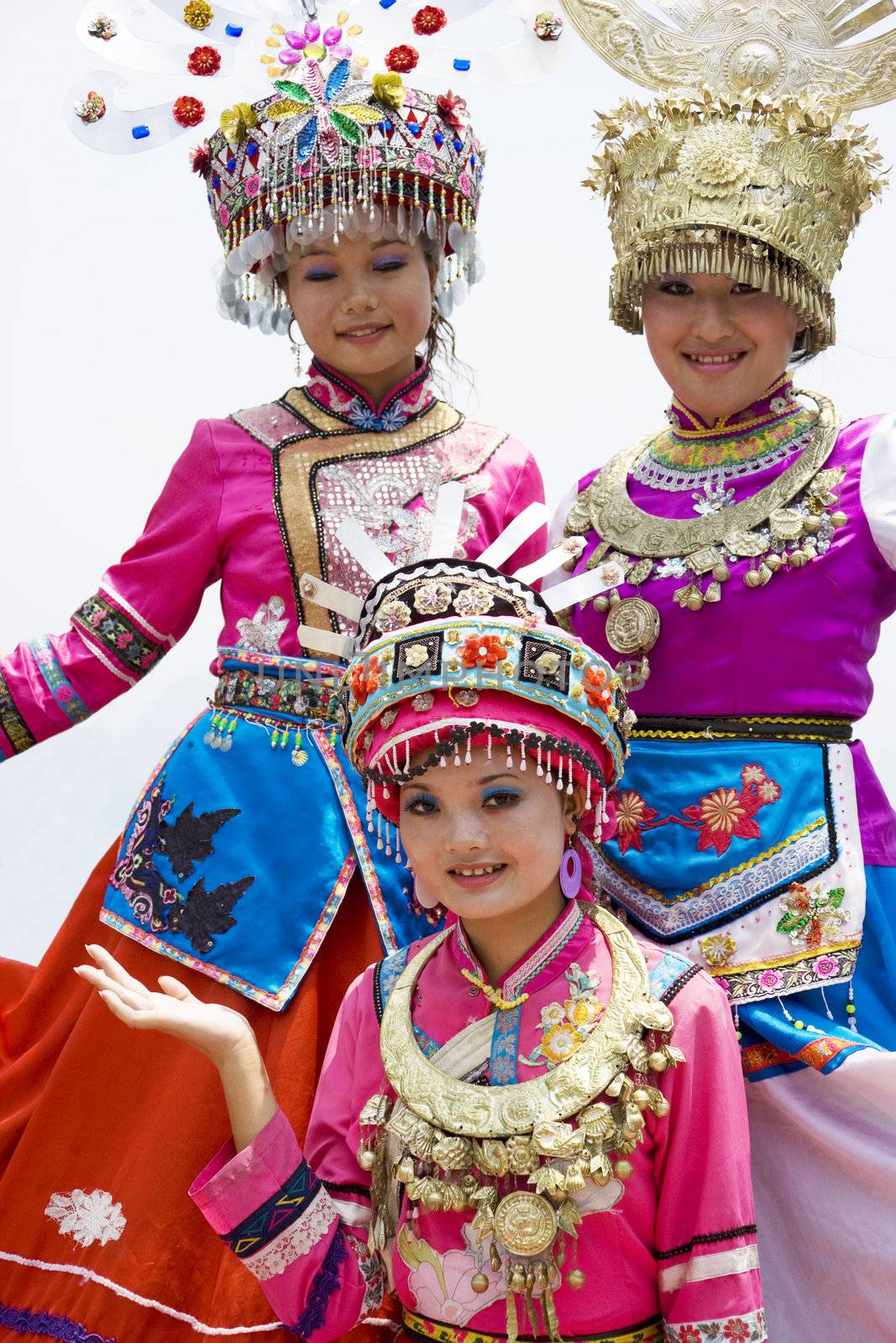 Image of young Chinese girls in traditional ethnic dress at Yao Mountain, Guilin, China.