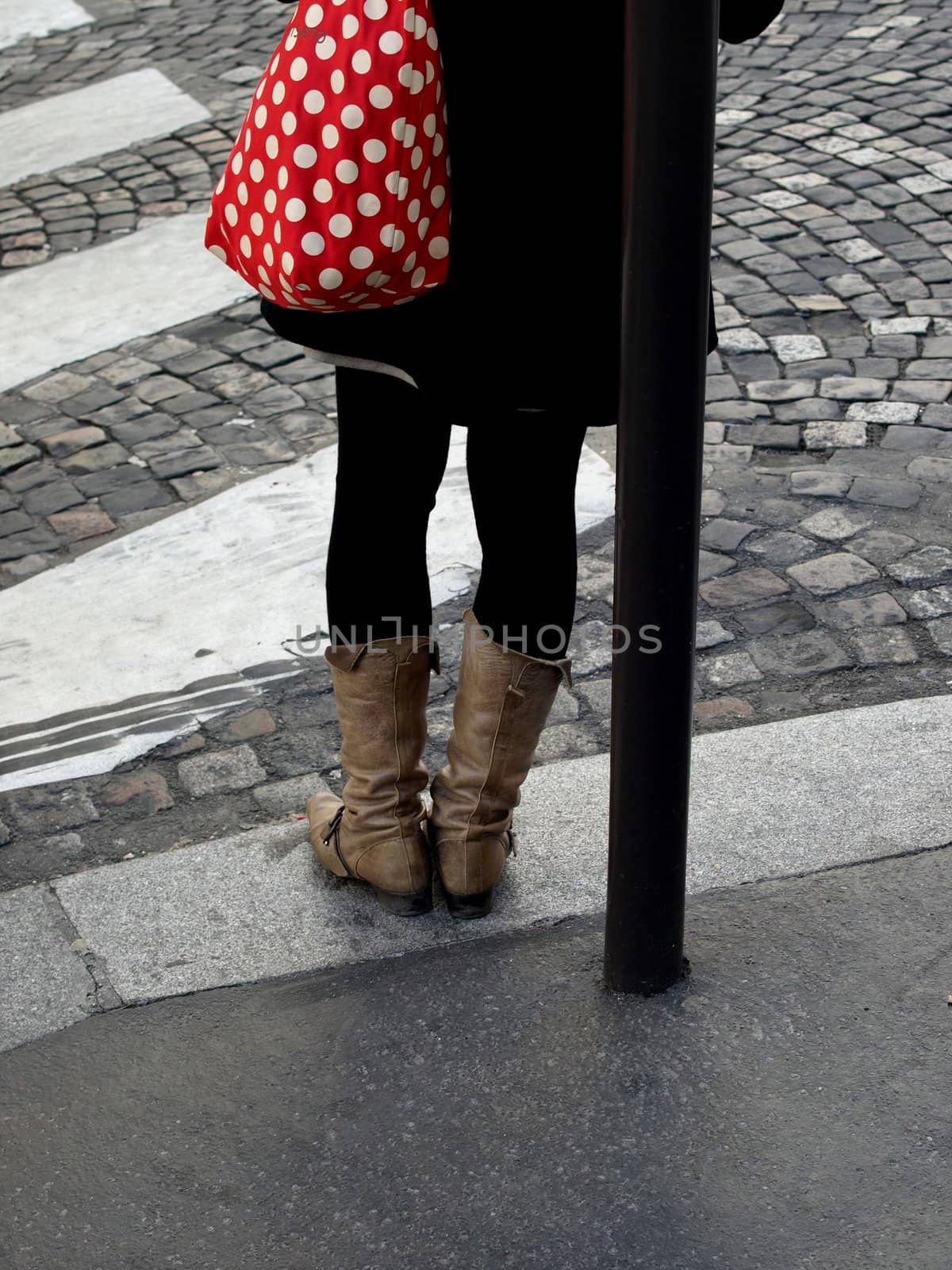Girl with a red bag.      