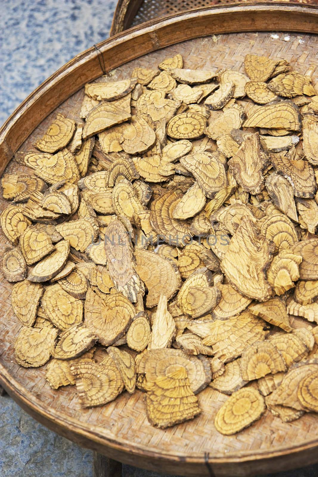 Image of tree barks being sun dried for traditional chinese medicine at the ancient town of Daxu, Guilin, China.