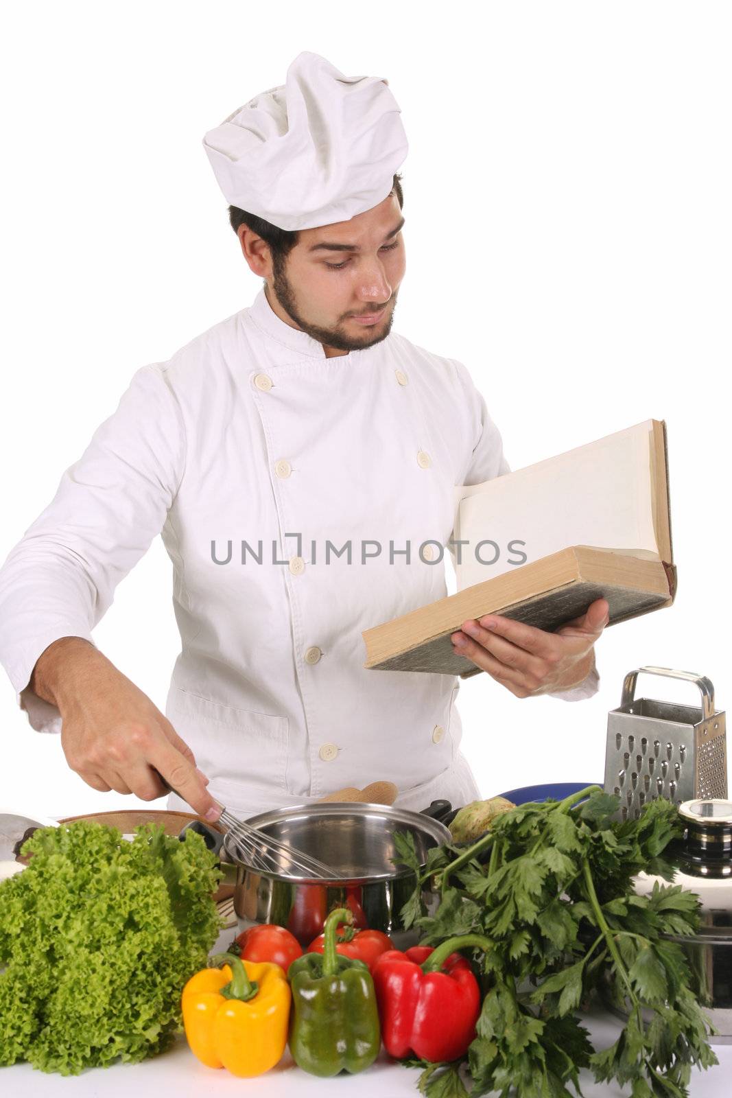 young chef preparing lunch on white background