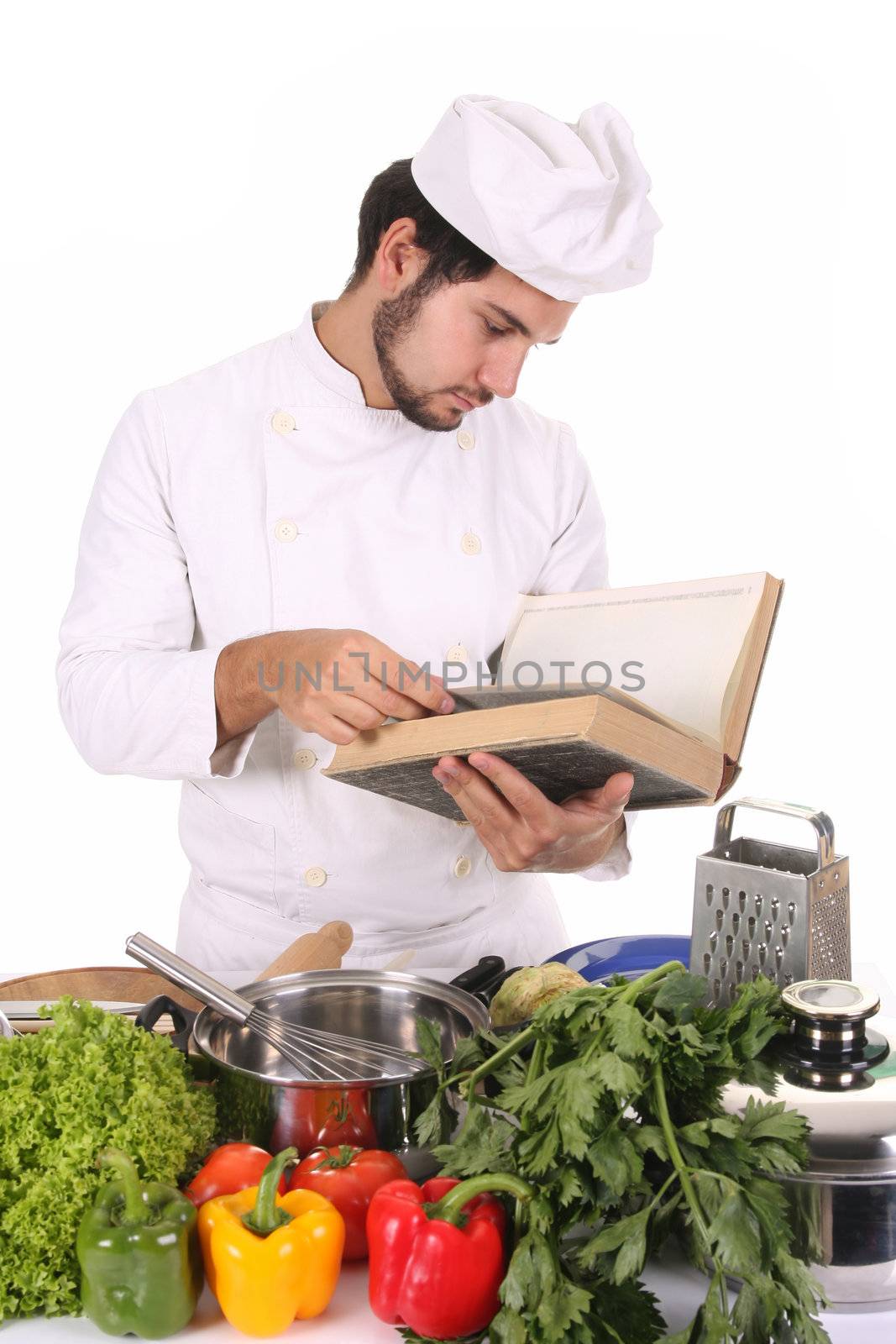 young chef preparing lunch on white background