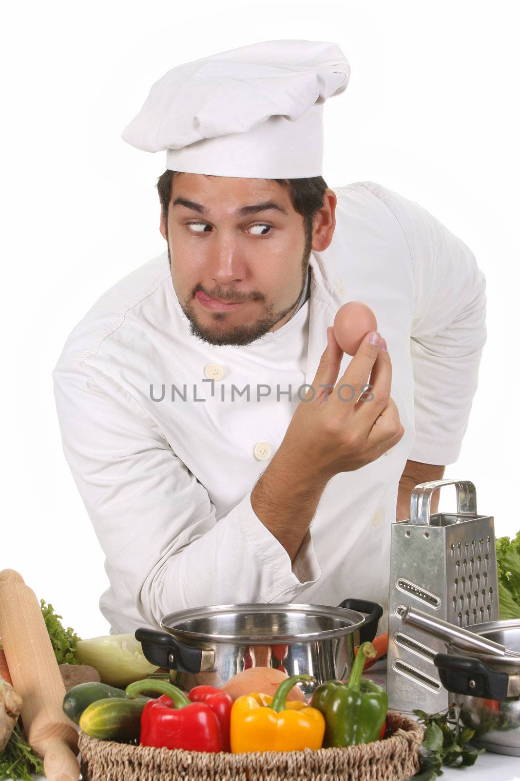 young funny chef with egg, isolated on white