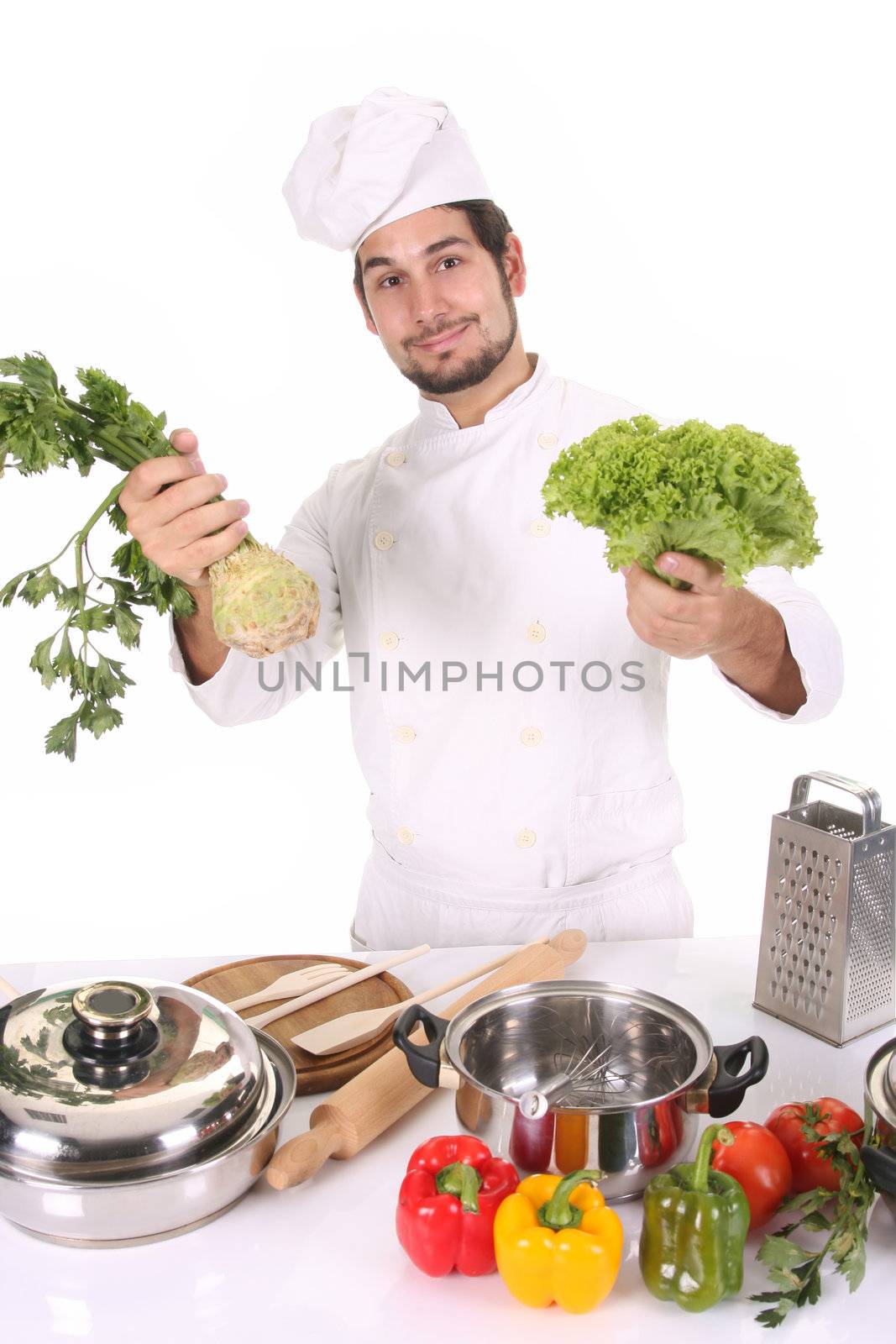 chef smelling the aroma of fresh salad