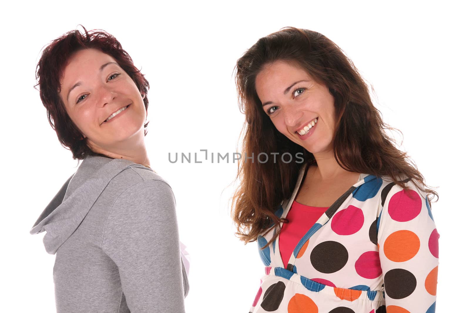 Two beautiful young woman over a white background