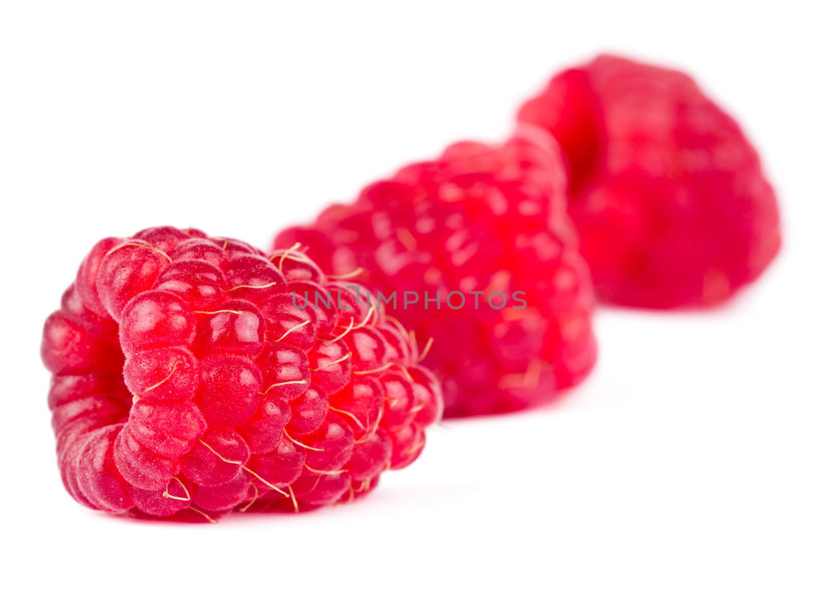 Raspberries on white background by Bedolaga
