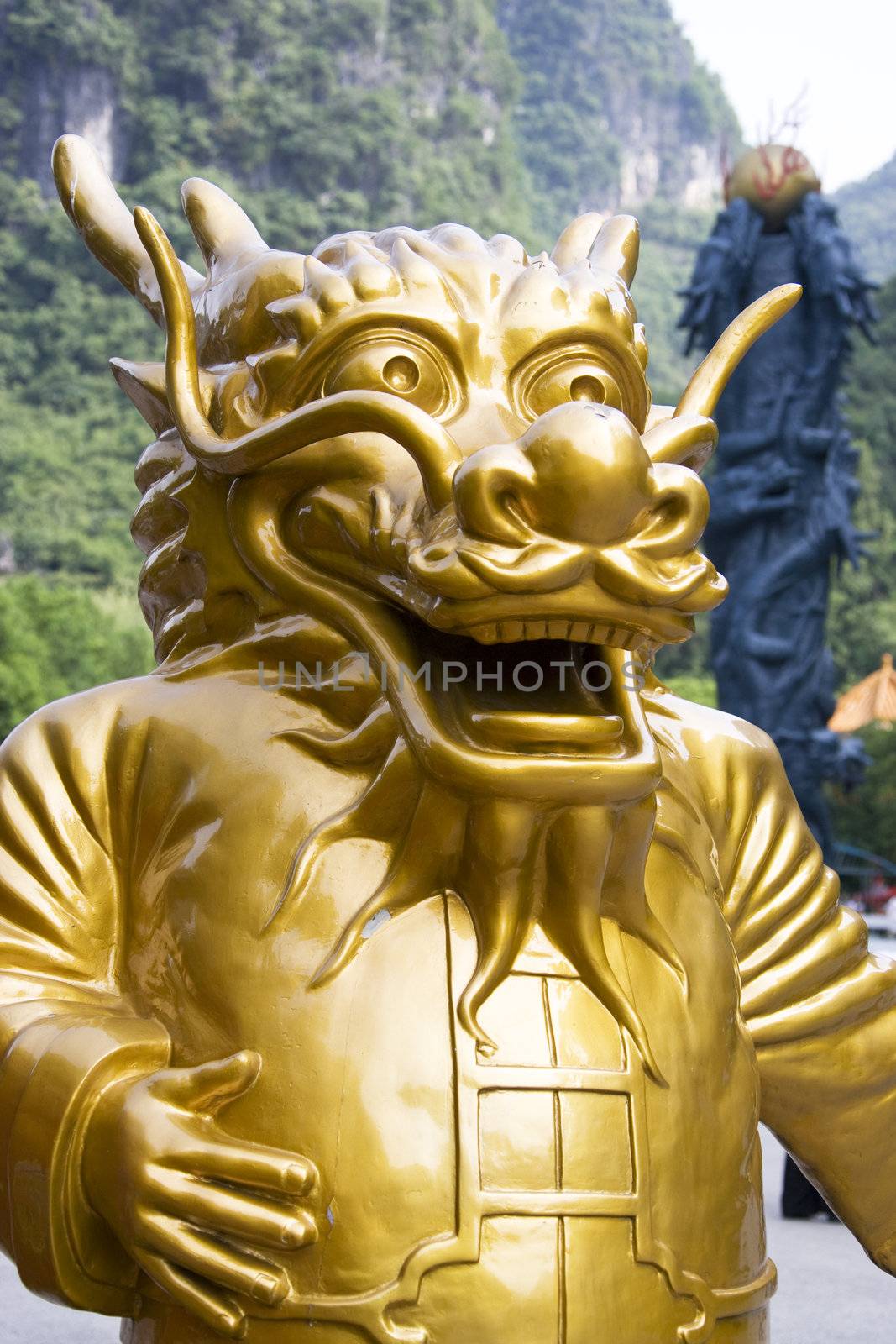 Image of a dragon guardian at the Assembly Dragon Cave entrance, Yangshuo, Guilin, China.