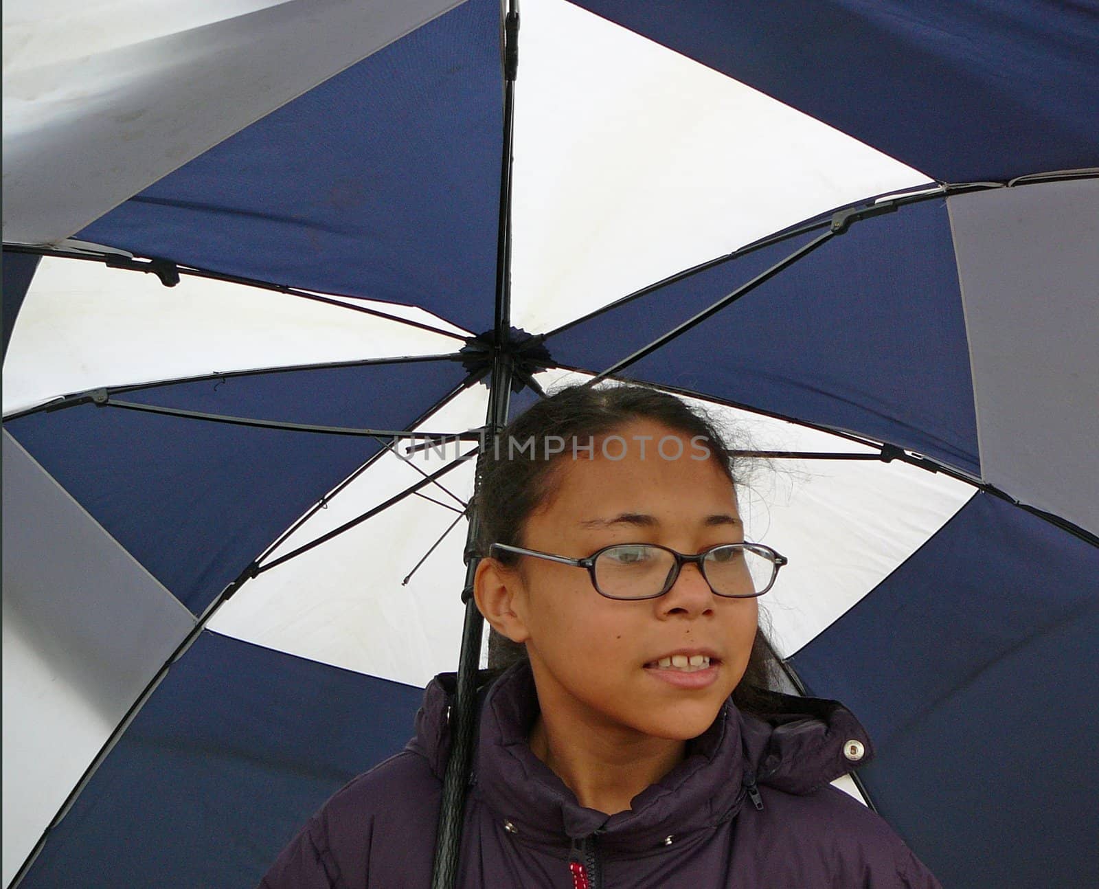 Girl under umbrella