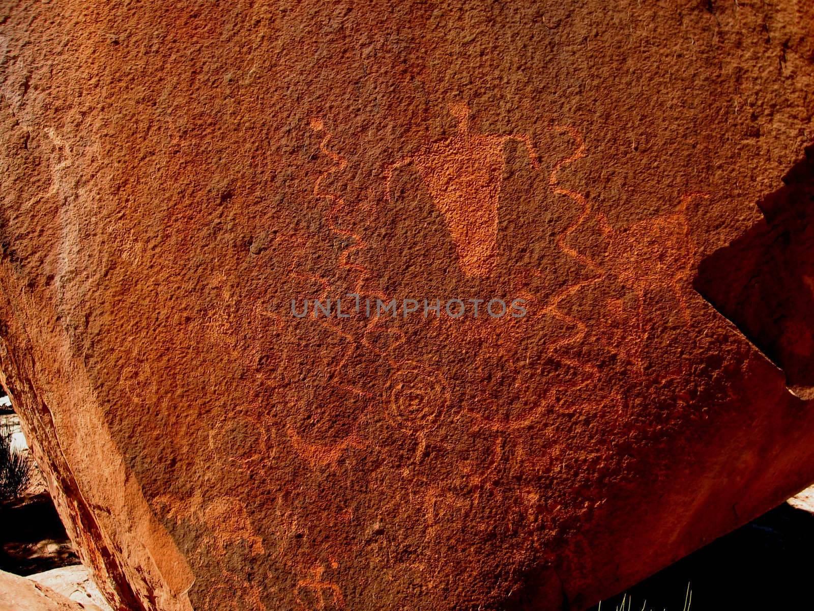 Historic Anasazi petroglyphs on huge sandstone boulder in Step Canyon, Utah, USA.