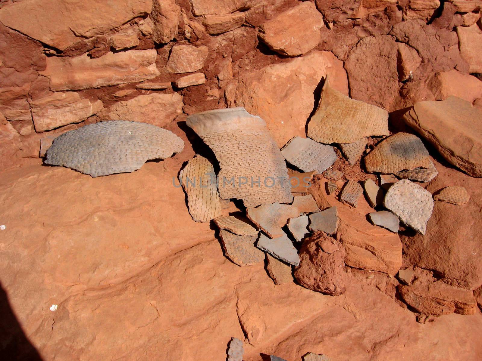 Finding of historic Anasazi pottery sherds (basketmaker style) in the desert of Utah, USA.