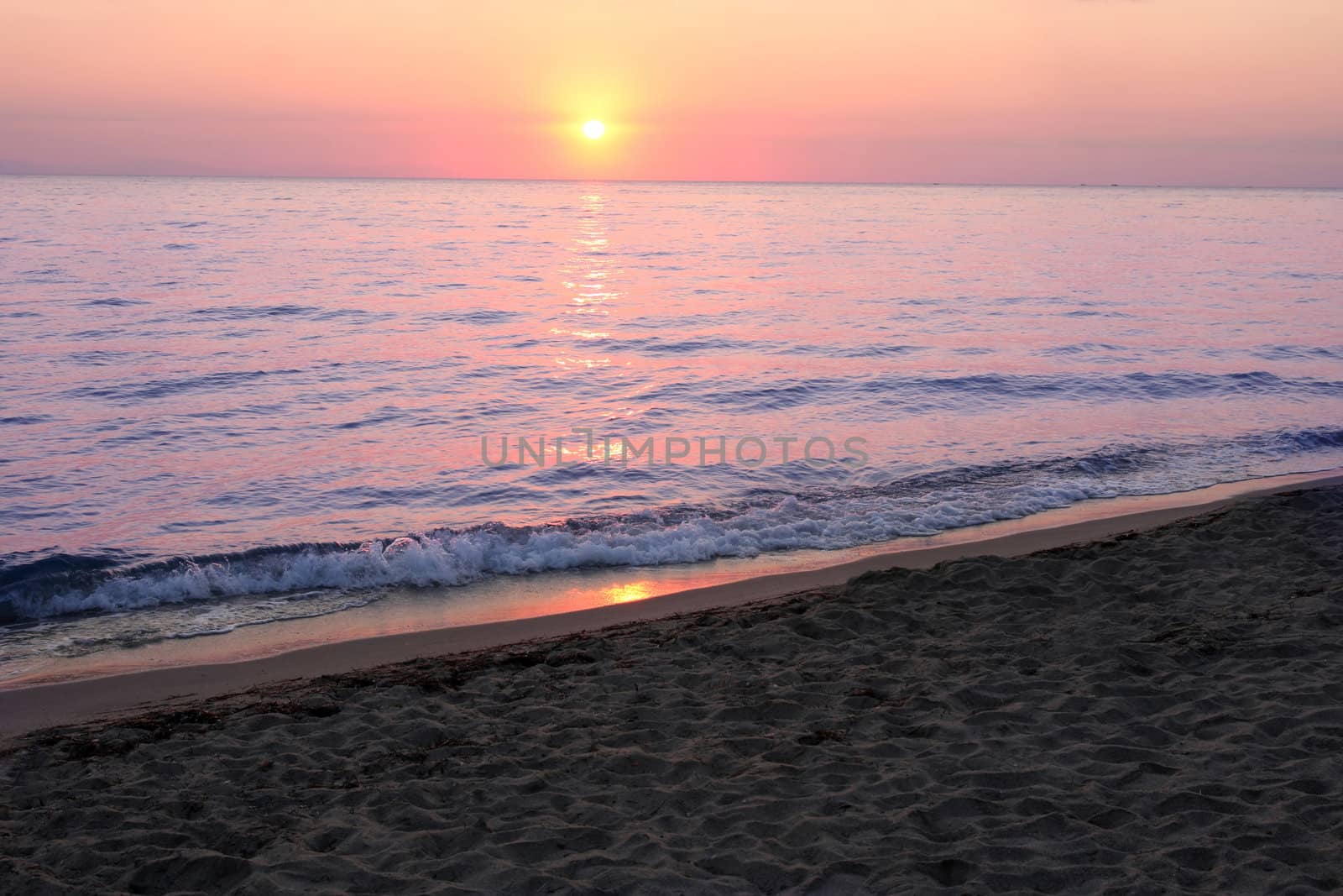 details of ocean and sunrise in Greece